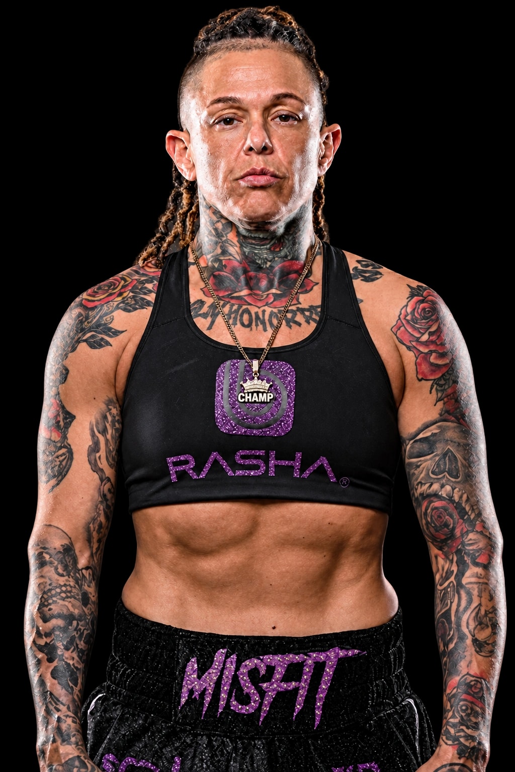 Christine Ferea standing in her black and purple fight kit